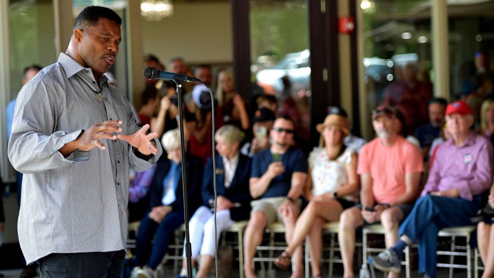 PHOTO: Republican Senate canididate Herschel Walker speaks to supporters during a campaign stop, in Ellijay, Ga., May 14, 2022. 