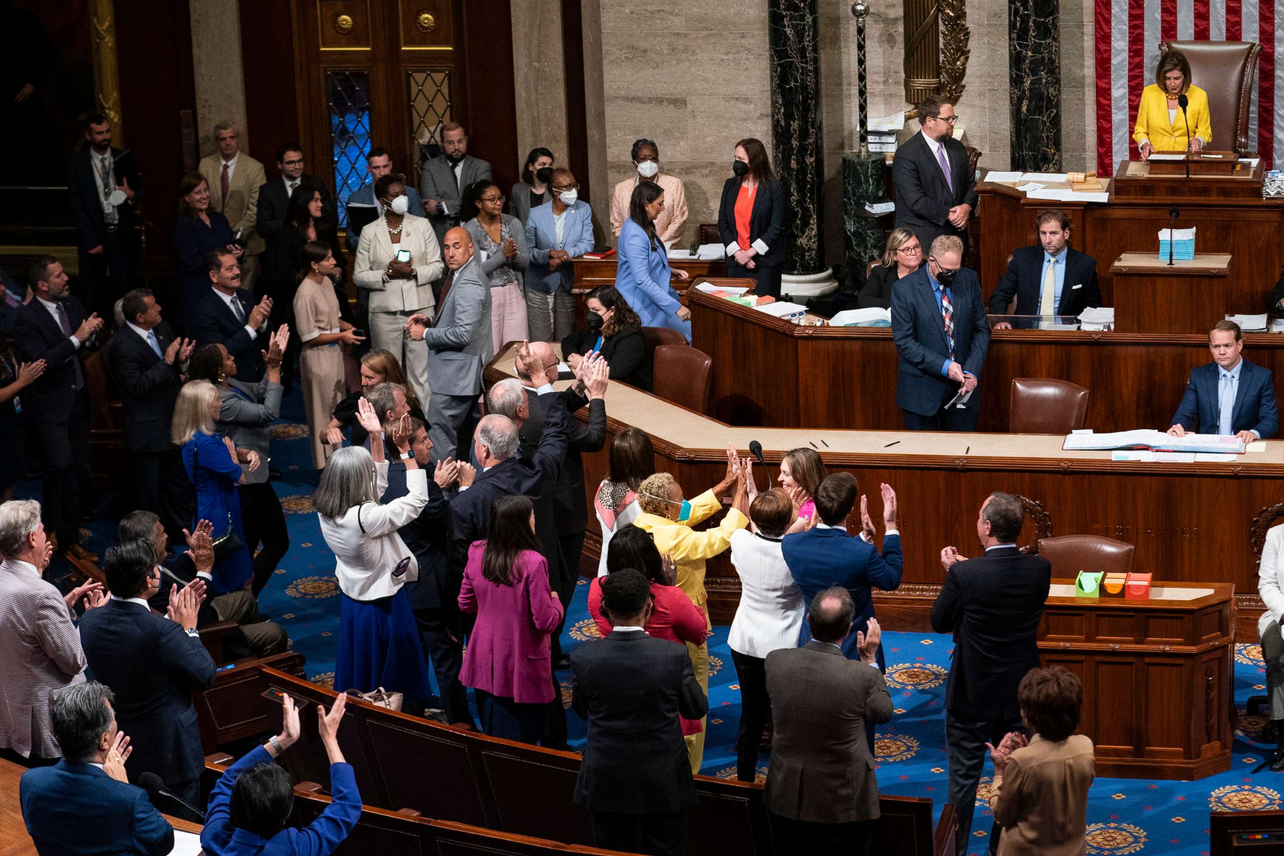 PHOTO: House Democrats celebrate after House Speaker Nancy Pelosi calls the final vote for the Inflation Reduction Act in the House Chamber of the U.S. Capitol in Washington, Aug. 12, 2022. 