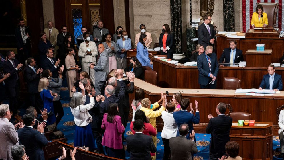 PHOTO: House Democrats celebrate after House Speaker Nancy Pelosi calls the final vote for the Inflation Reduction Act in the House Chamber of the U.S. Capitol in Washington, Aug. 12, 2022. 