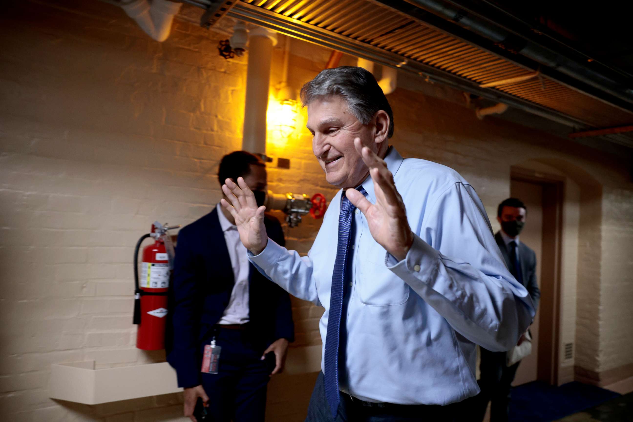 PHOTO: Sen. Joe Manchin  walks in the basement of the Capitol in Washington, on Dec. 15, 2021.