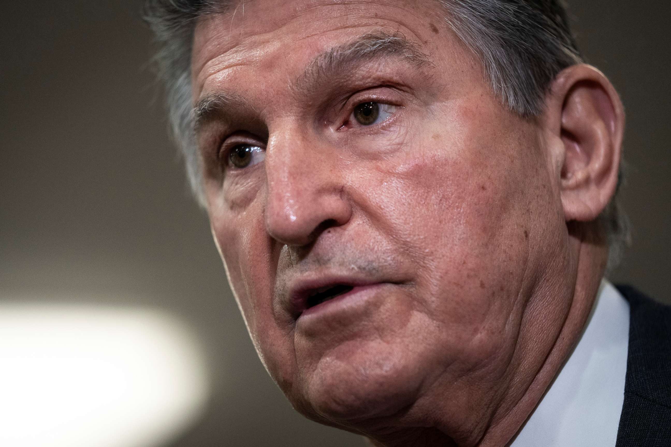 PHOTO: Sen. Joe Manchin  speaks to reporters after a closed door briefing with Senators at the U.S. Capitol Building in Washington, Feb. 03, 2022.