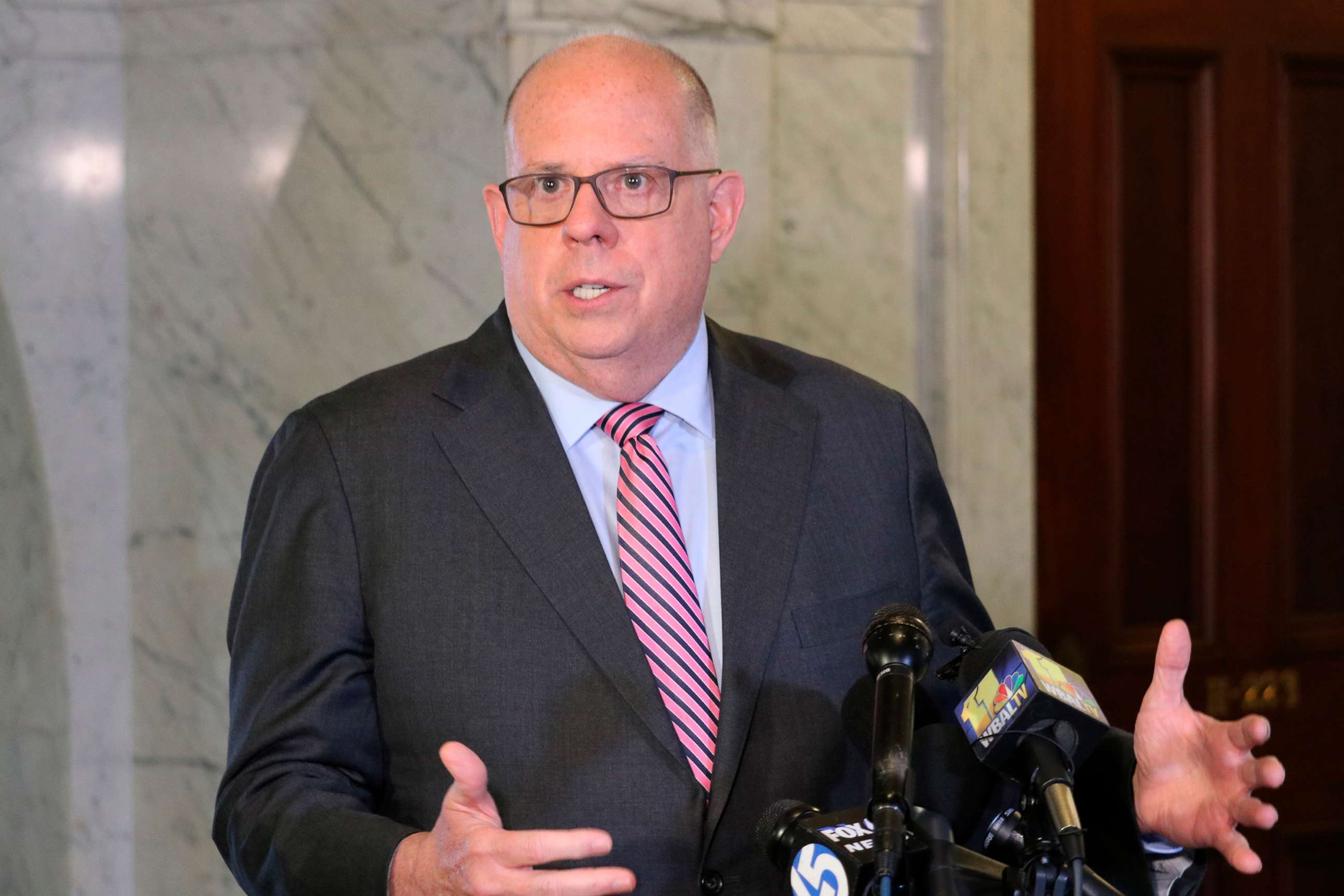 PHOTO: Maryland Gov. Larry Hogan talks to reporters in Annapolis, Md., April, 4, 2022.