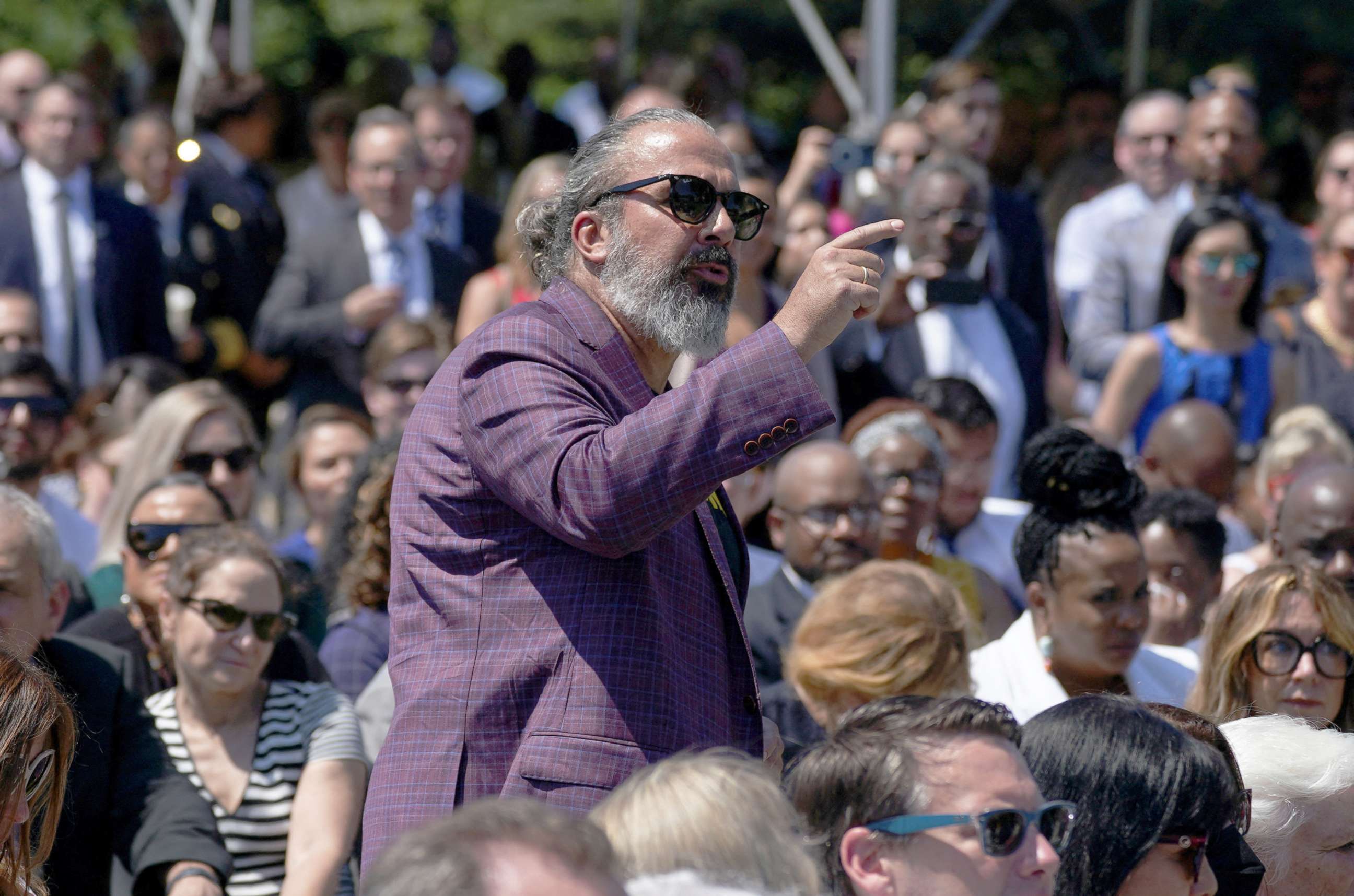 PHOTO: Manuel Oliver, whose son Joaquin was killed in the 2018 mass shooting at Marjory Stoneman Douglas High School in Parkland, Florida, calls for additional gun control actions as he interrupts President Joe Biden in Washington, July 11, 2022.