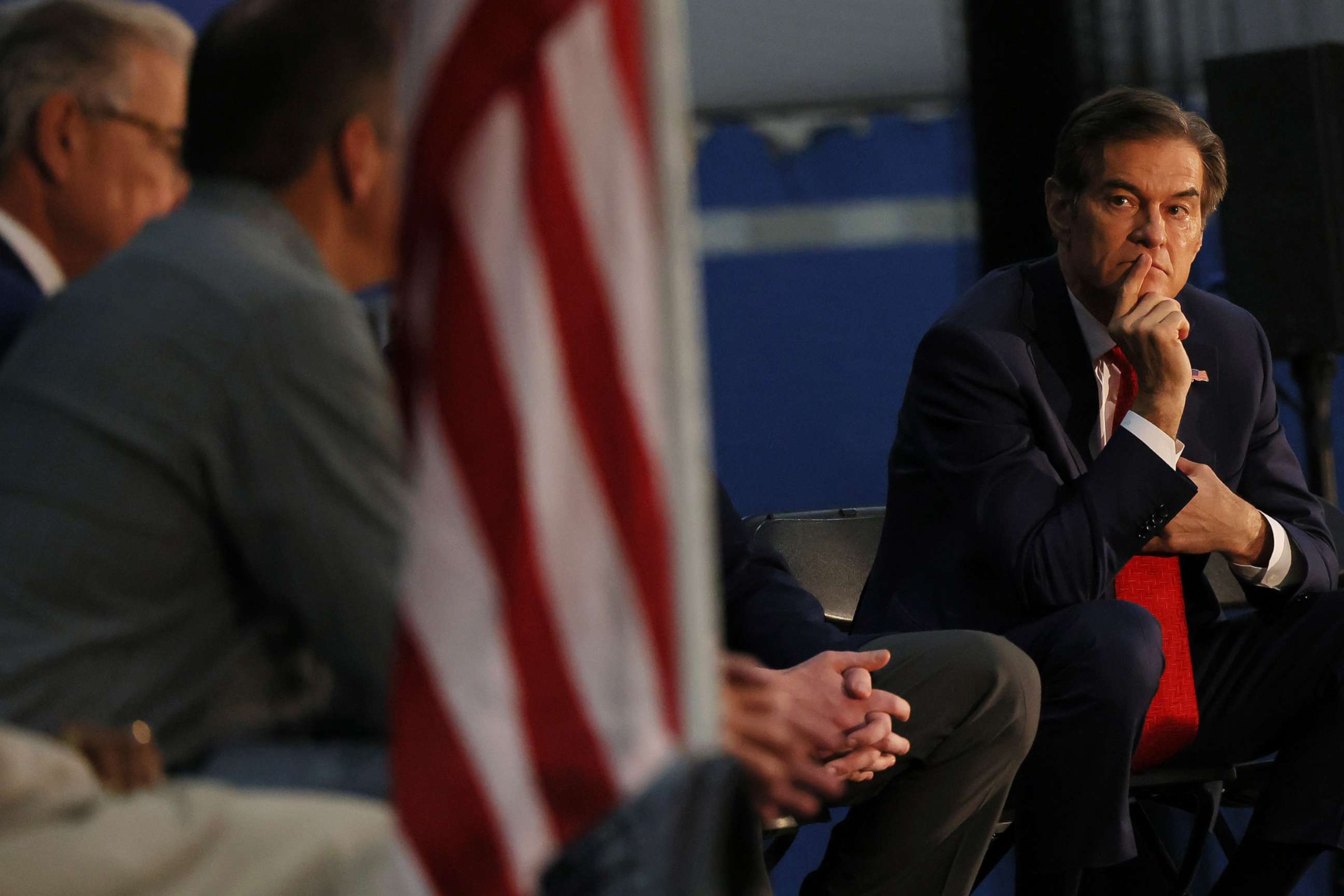 PHOTO: Pennsylvania U.S. Senate candidate Dr. Mehmet Oz looks over at other candidates during a Republican leadership forum in Newtown, Pa., May 11, 2022.