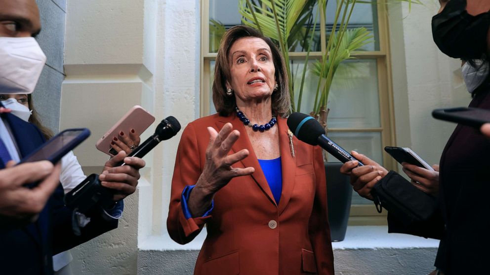 PHOTO: Speaker of the House Nancy Pelosi talks with reporters after departing a House Democratic whip meeting in the basement of the U.S. Capitol on Sept. 29, 2021.