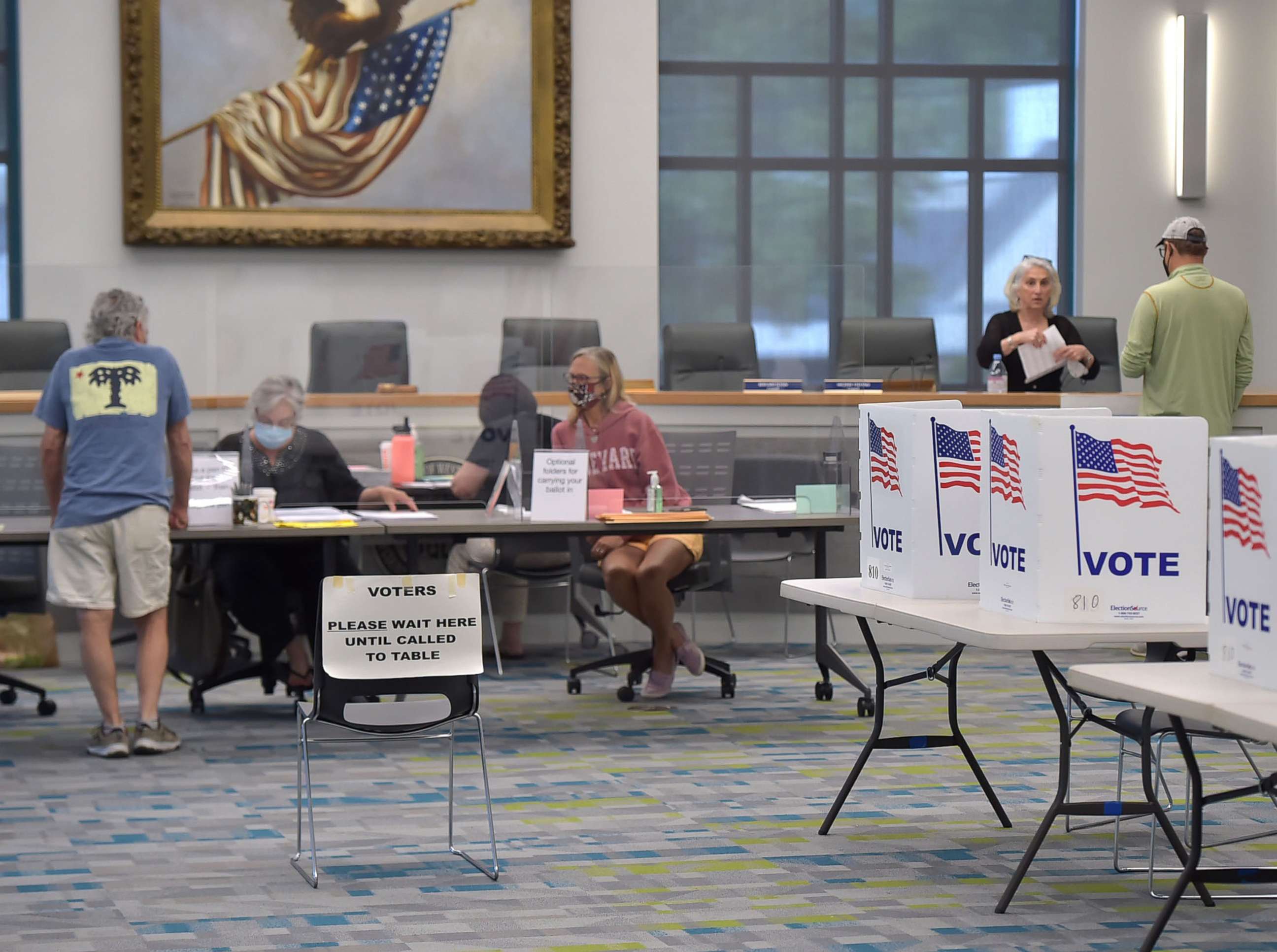 PHOTO: Voters get ballots at Borough Hall in West Chester, Pa., May 18, 2021.