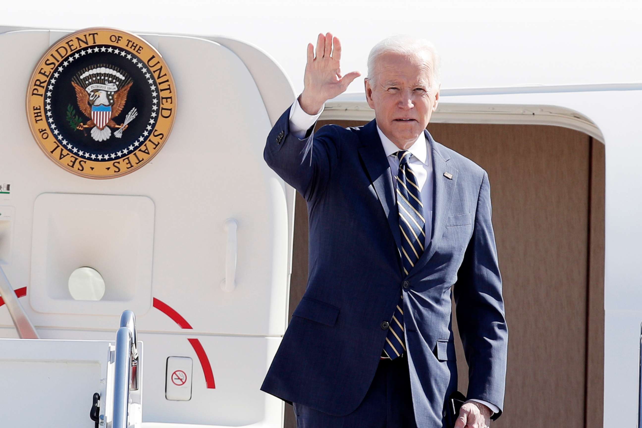 PHOTO: President Joe Biden waves before boarding Air Force One at Andrews Air Force Base, Md., March 11, 2022.