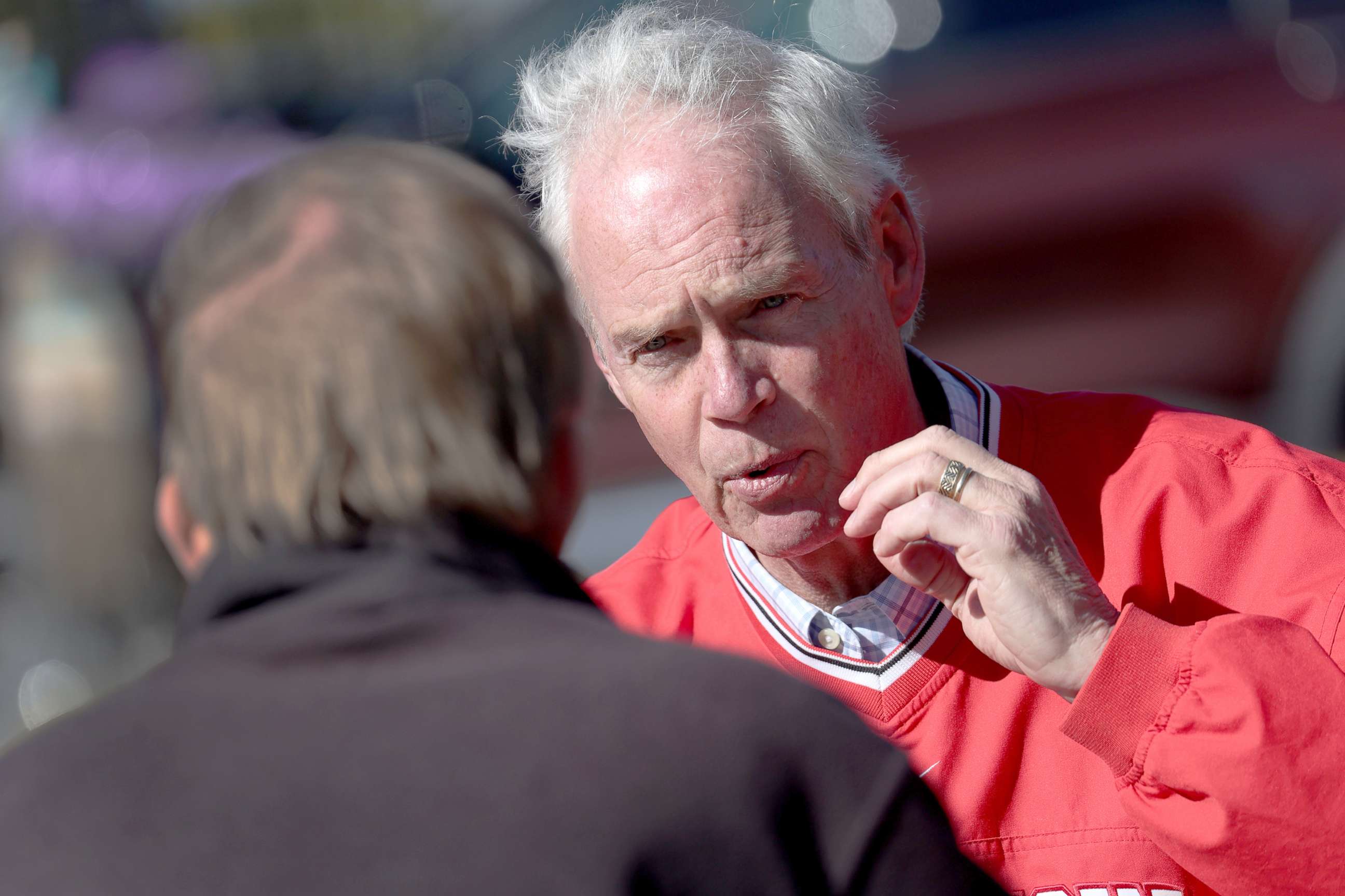 PHOTO: Sen. Ron Johnson speaks to a reporter during a campaign stop in Muskego, Wisc., Oct. 08, 2022.