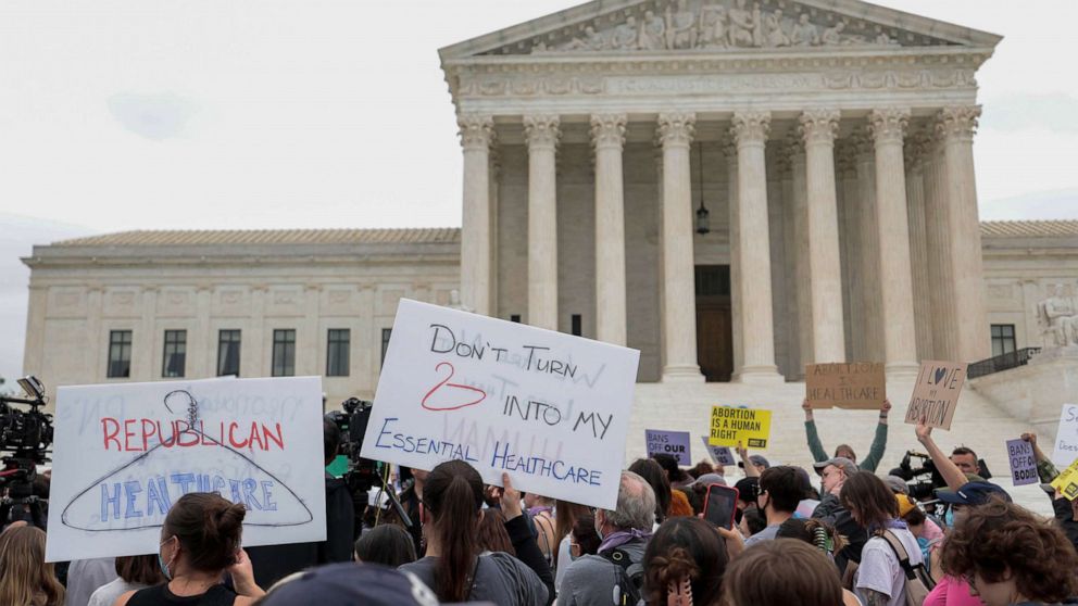 PHOTO: Activists demonstrate in front of the U.S. Supreme Court Building in response to the leaked Supreme Court draft decision to overturn Roe v. Wade in Washington,  May 03, 2022.