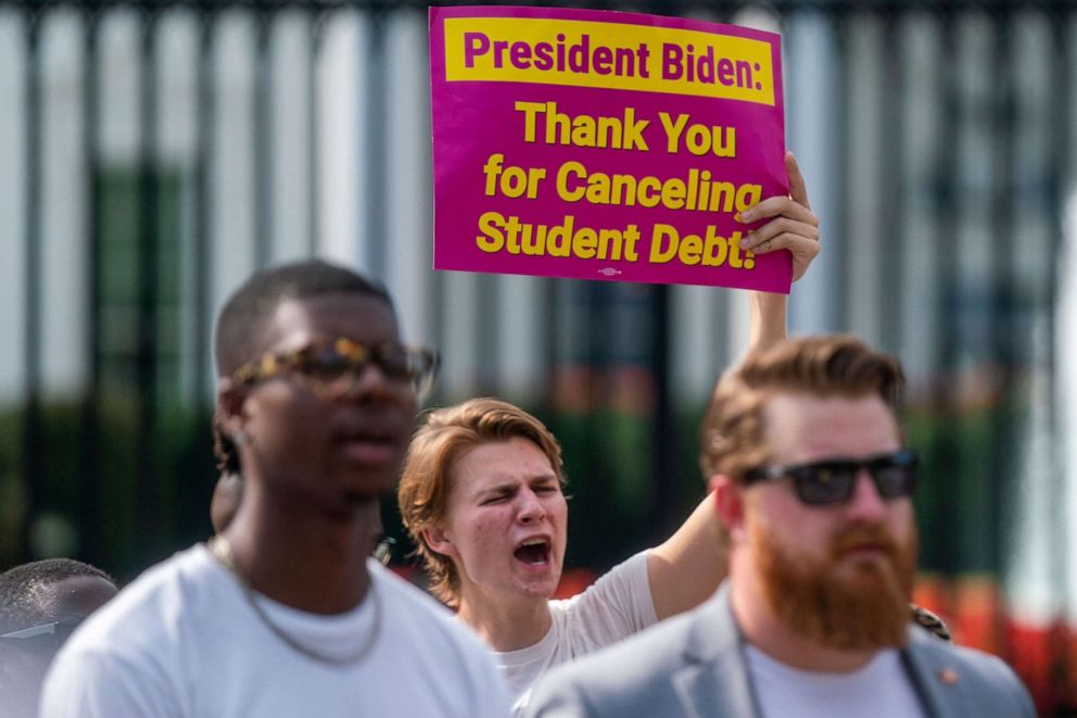 PHOTO: Student loan forgiveness advocates attend a press conference on Pennsylvania Avenue in front of the White House in Washington, Aug. 25 2022. 