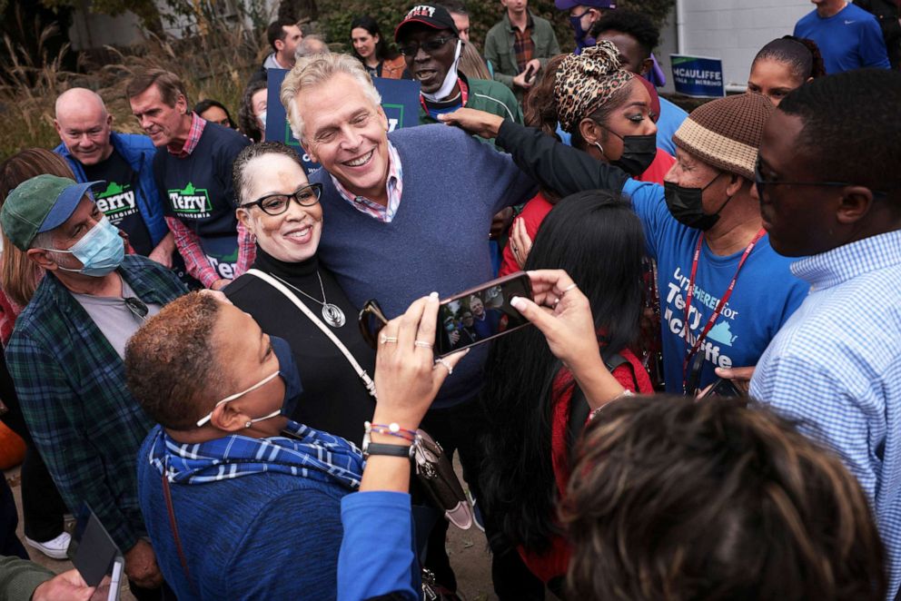 PHOTO: Democratic gubernatorial candidate Terry McAuliffe greets supporters after speaking at a canvass launch rally October 31, 2021 in Manassas, Va., Oct. 31, 2021. 