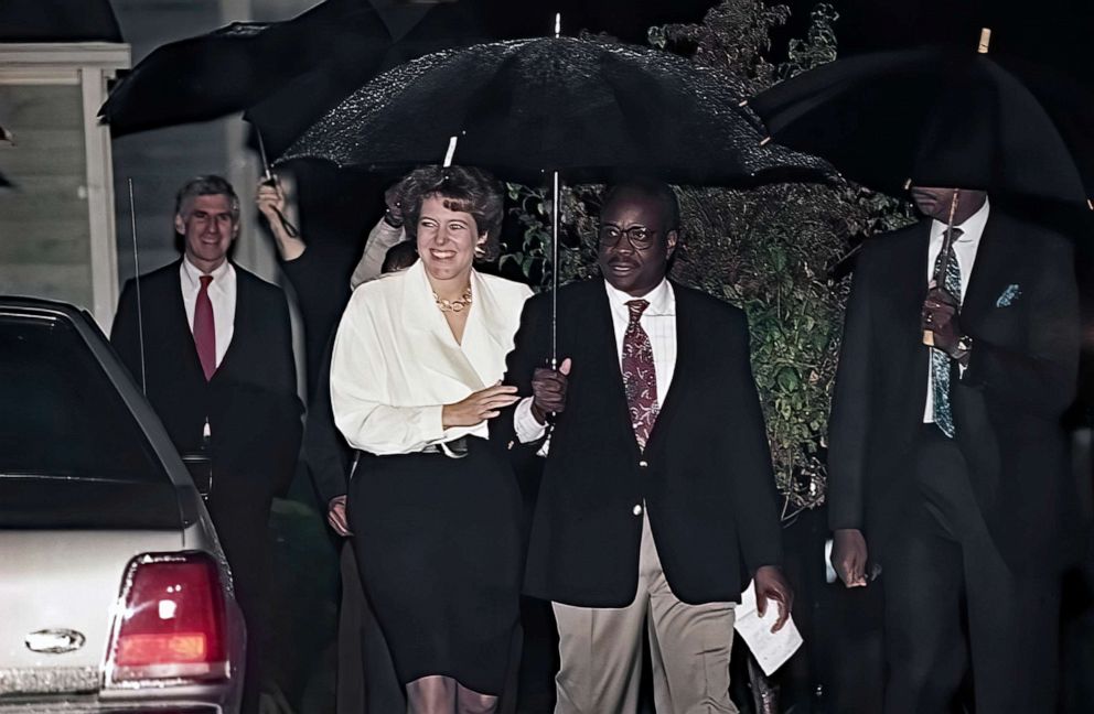 PHOTO: Virginia Thomas and Clarence Thomas walk to the microphones for a news conference to acknowledge the vote of the Senate Judiciary Committee confirming his nomination as Judge to the Supreme Court in Alexandria Va., Oct. 15, 1991.