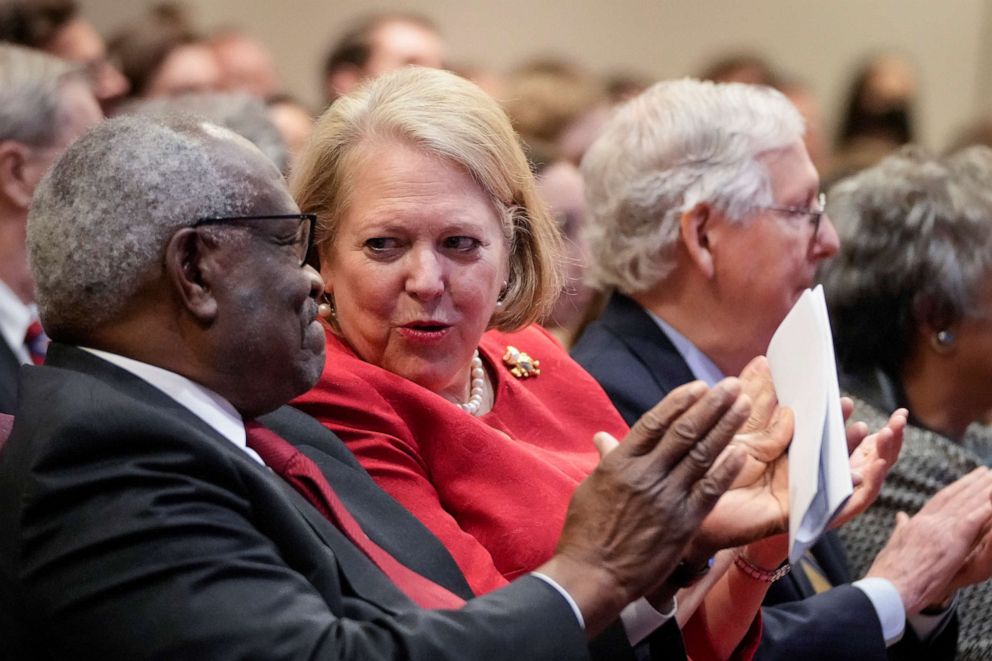 PHOTO: Associate Supreme Court Justice Clarence Thomas sits with his wife and Virginia Thomas while he waits to speak at the Heritage Foundation, Oct. 21, 2021, in Washington, D.C.