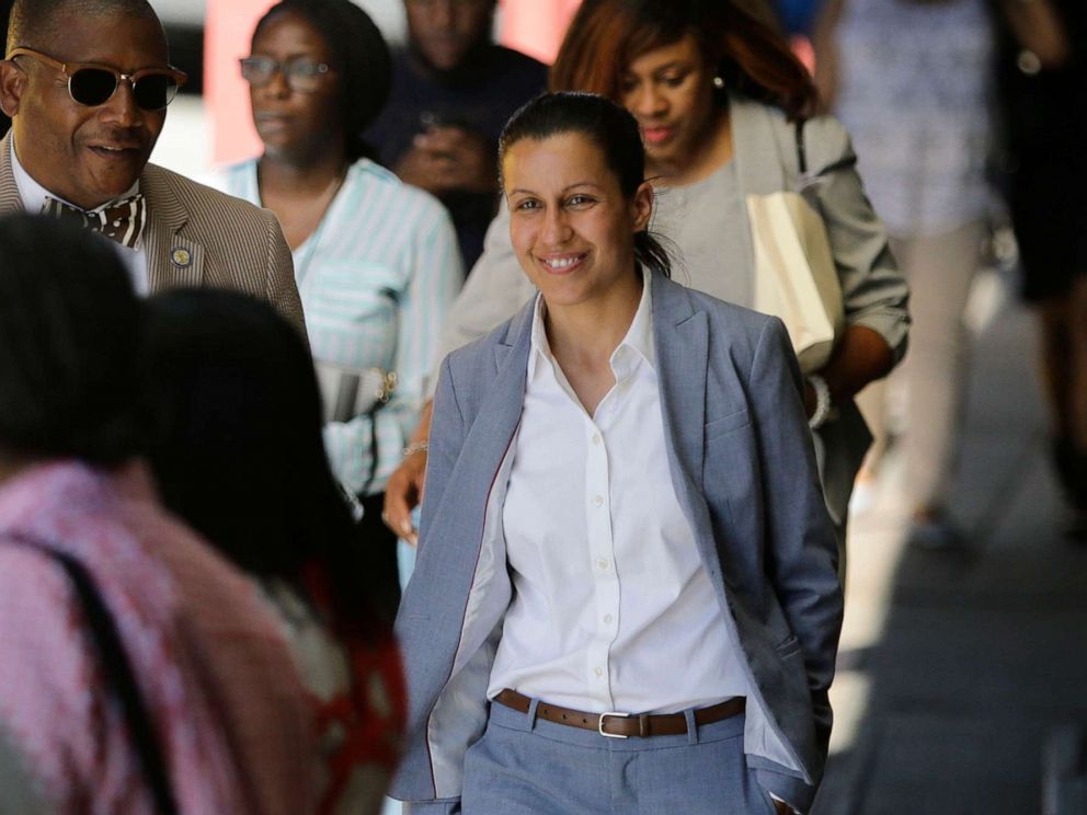PHOTO: Queens district attorney candidate Tiffany Caban walks among commuters Wednesday, June 26, 2019, in the Queens borough of New York