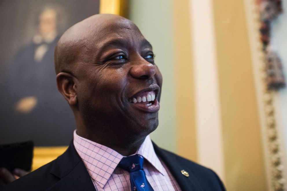 PHOTO: Sen. Tim Scott talks with reporters as the Senate takes a procedural vote on the spending bill, Dec. 21, 2018, in Washington, D.C.