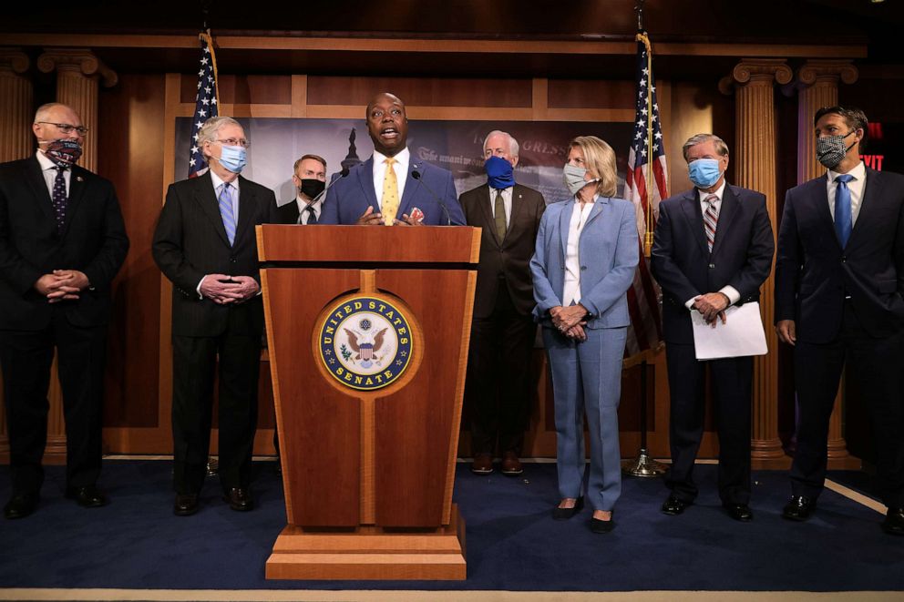 PHOTO: Sen. Tim Scott is joined by (L-R) Rep. Pete Stauber, Sen. Mitch McConnell, Sen. James Lankford, Sen. John Cornyn, Sen. Shelley Moore Capito, Sen. Lindsey Graham, and Sen. Ben Sasse for a news conference, June 17, 2020, in Washington, DC.