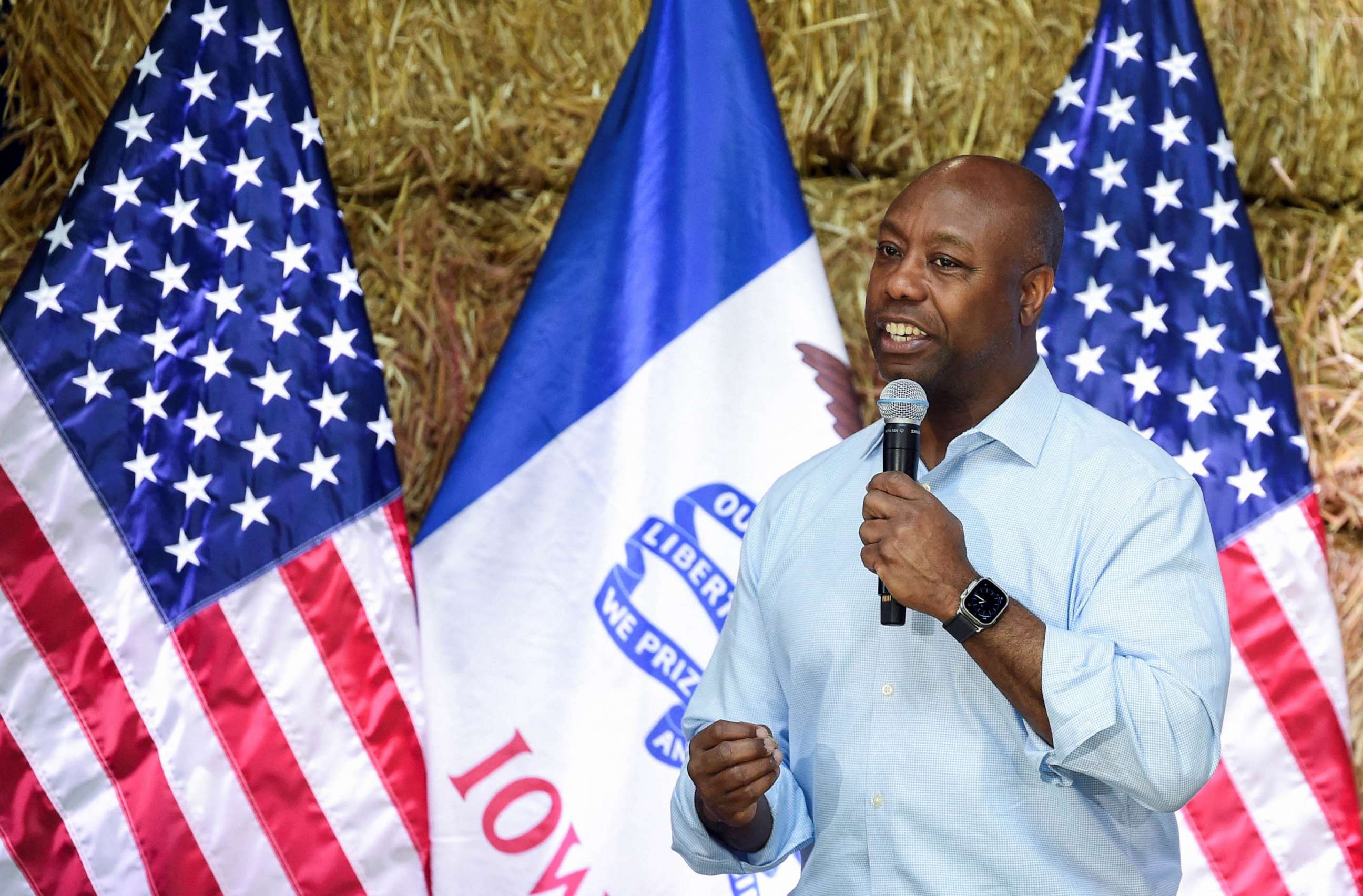 PHOTO: Republican presidential candidate Tim Scott speaks at the "Roast and Ride" event hosted by U.S. Senator Joni Ernst while campaigning in Des Moines, Iowa, June 3, 2023.