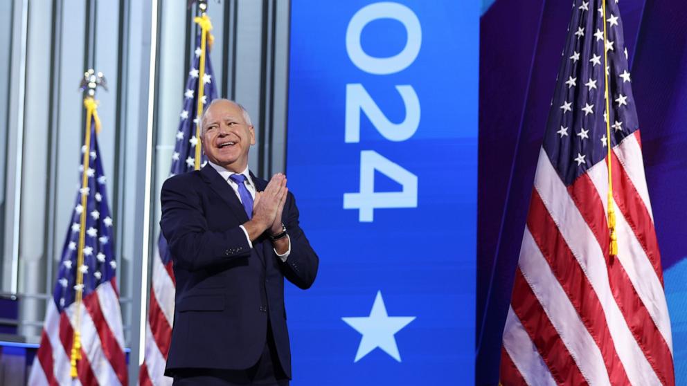 PHOTO: Democratic vice presidential candidate Minnesota Gov. Tim Walz arrives to speak on stage on Day 3 of the Democratic National Convention, Aug. 21, 2024 in Chicago.