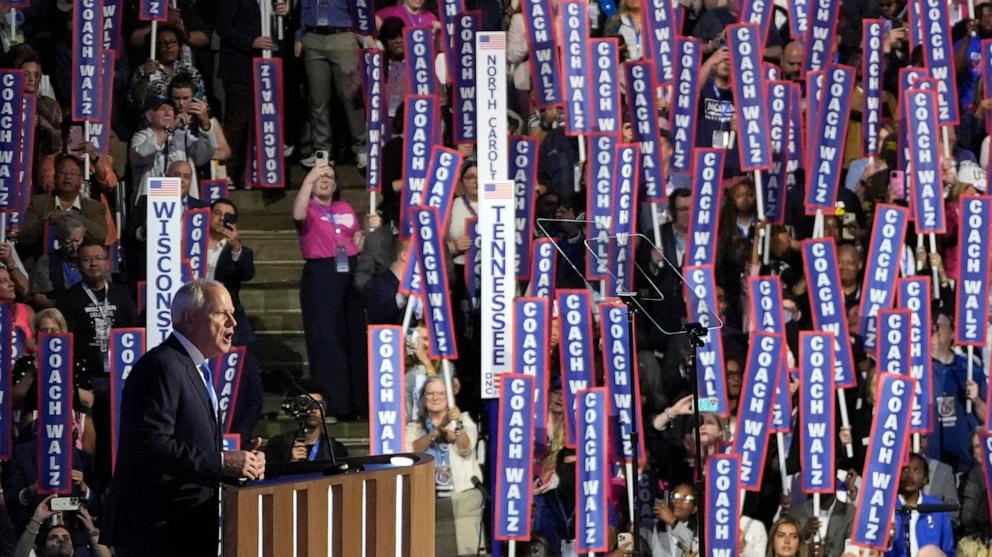 PHOTO: Democratic vice presidential nominee Minnesota Governor Tim Walz takes the stage on Day 3 of the Democratic National Convention in Chicago, Aug. 21, 2024.