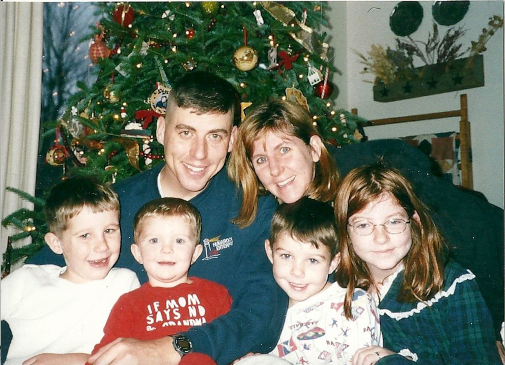 PHOTO: Former Lt. Col. Timothy Brooks celebrated an early Christmas with his wife, Kim Brooks, and their four children in November 2001 at their home in Fort Drum, N.Y. 