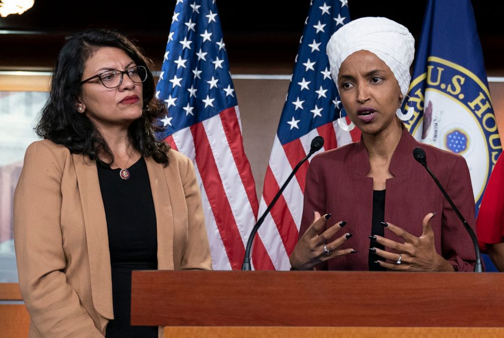 PHOTO: Rep. Ilhan Omar, right, speaks, as Rep. Rashida Tlaib listens, during a news conference at the Capitol in Washington, July 15, 2019.