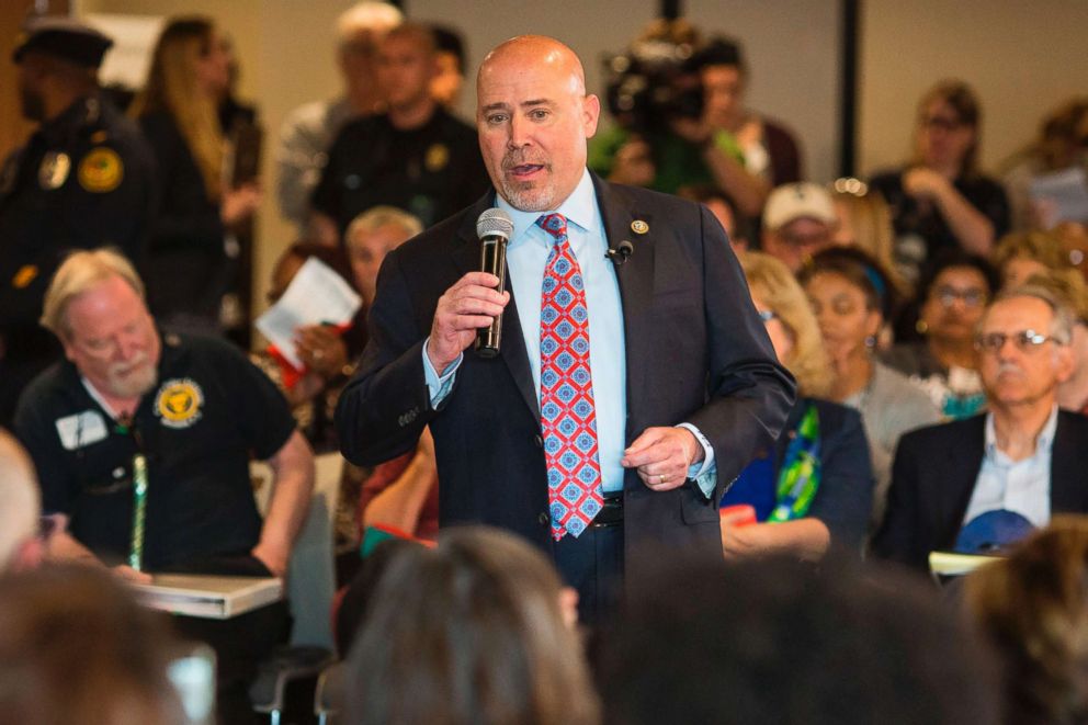 PHOTO: US Representative Tom MacArthur speaks to constituents during a town hall meeting in Willingboro, New Jersey, May 10, 2017.