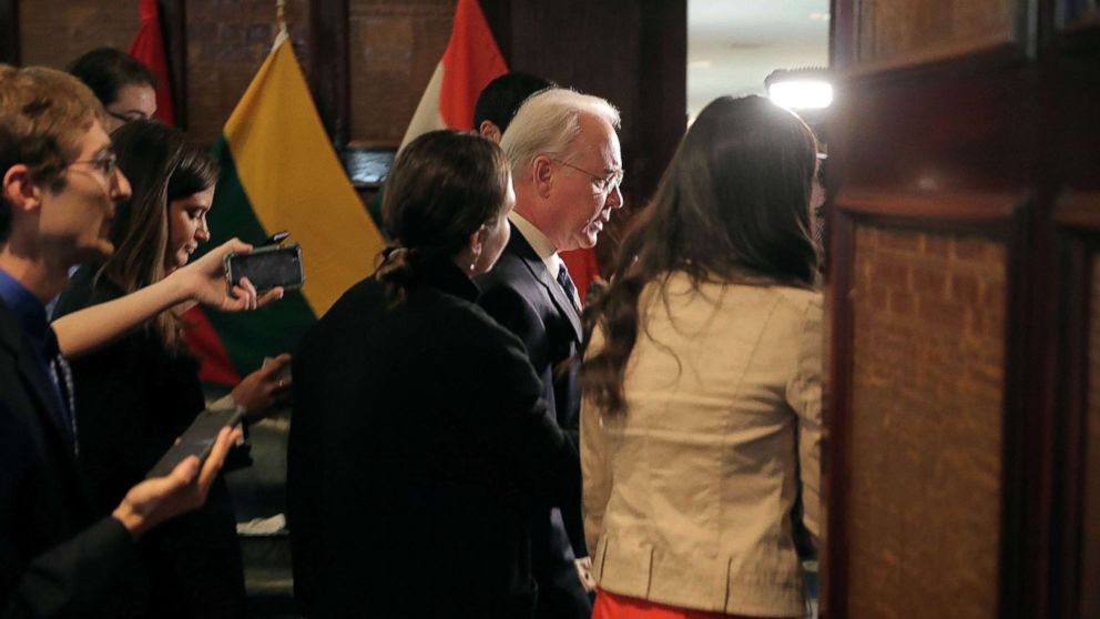 Heath and Human Services Secretary Tom Price is followed by reporters at the National Press Club, Sept. 28, 2017 in Washington, D.C. 
