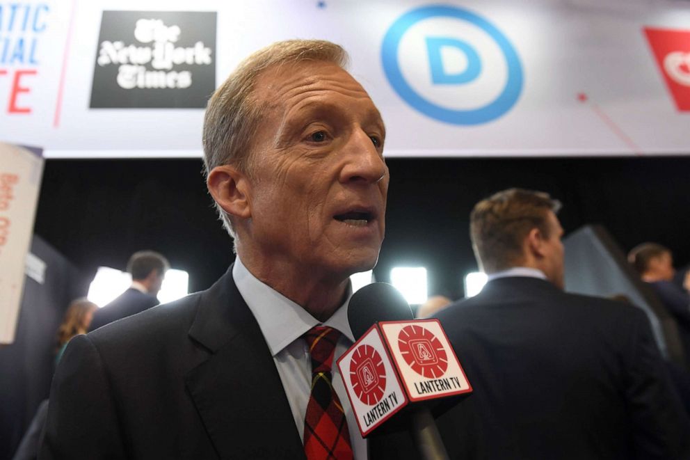 PHOTO: Democratic presidential hopeful businessman Tom Steyer speaks to the press in the spin room after the fourth Democratic primary debate at Otterbein University in Westerville, Ohio, Oct. 15, 2019.