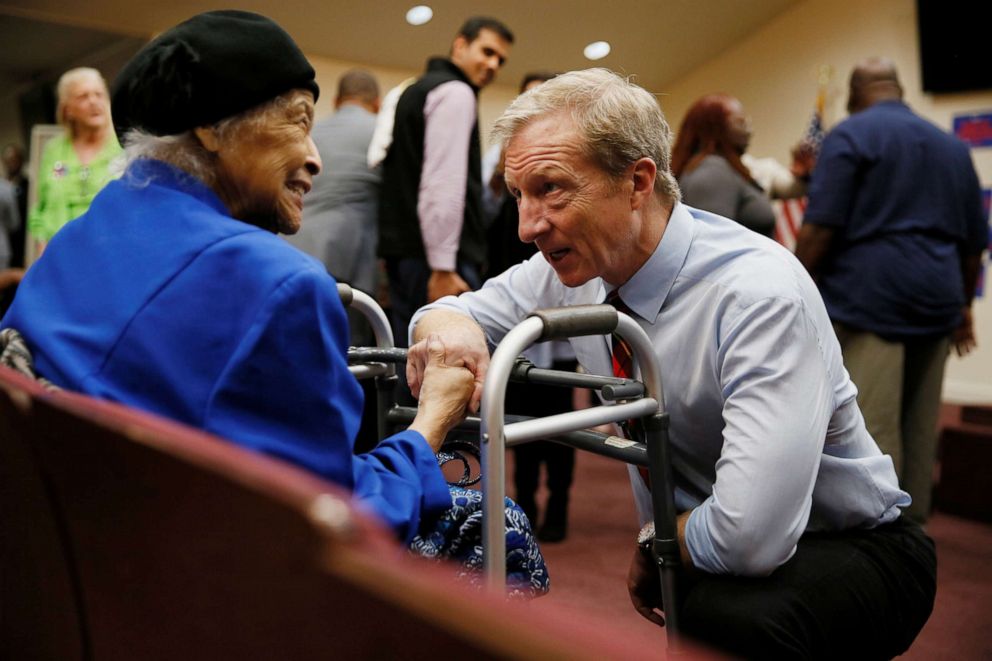 PHOTO: Democratic presidential candidate Tom Steyer talks to Jeanette Thompson, 87, after a campaign event in Yemassee, S.C., Feb. 23, 2020.