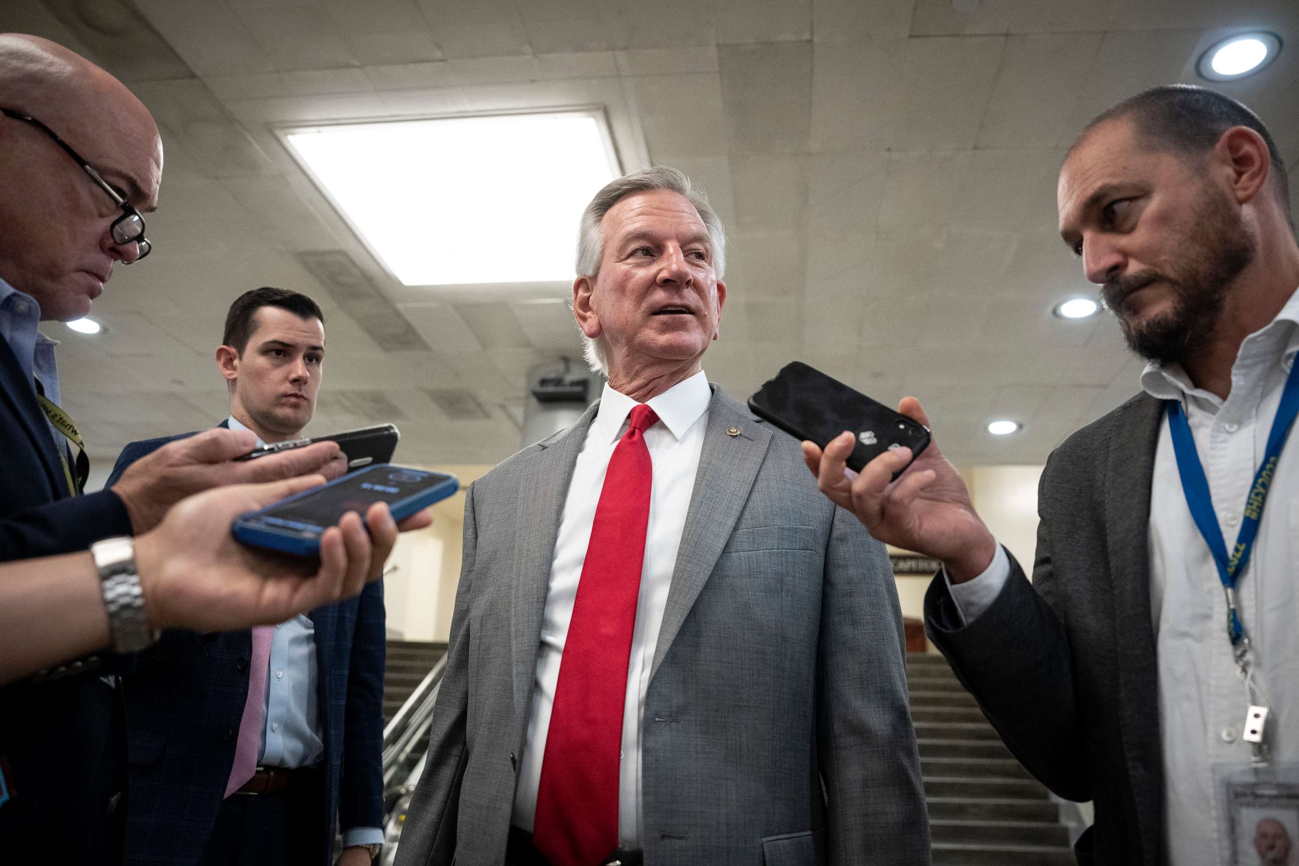 PHOTO: Sen. Tommy Tuberville speaks to reporters in the Senate subway at the U.S. Capitol July 10, 2023 in Washington, DC.