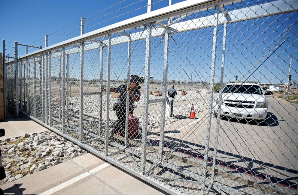 PHOTO: An officer from the Department of Homeland Security closes the exterior door of the Tornillo, Texas, immigration detention center near the Mexican border on June 12, 2018.