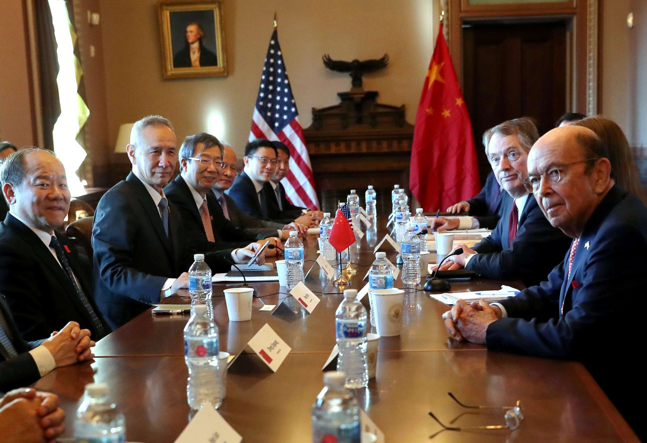 PHOTO: U.S. Trade Representative Robert Lighthizer speaks across from China's Vice Premier Liu He during the opening of U.S.-China Trade Talks in the Eisenhower Executive Office Building at the White House in Washington, Jan.30, 2019.