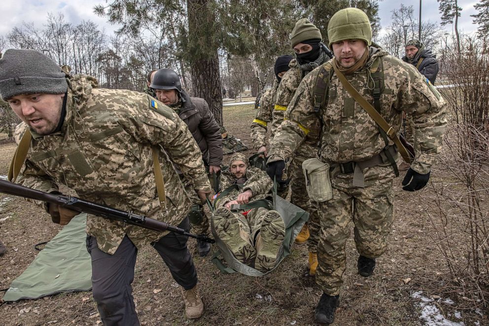 PHOTO: Members of the Territorial Defense Forces learn how to give first aid as they attend a training session, in Kyiv, Ukraine, March 9, 2022.