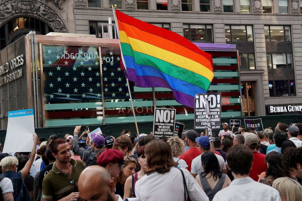 PHOTO: A rainbow flag flies in Times Square, July 26, 2017, in New York, as people protest President Donald Trump's announcement that he plans to reinstate a ban on transgender individuals from serving in any capacity in the U.S. military.