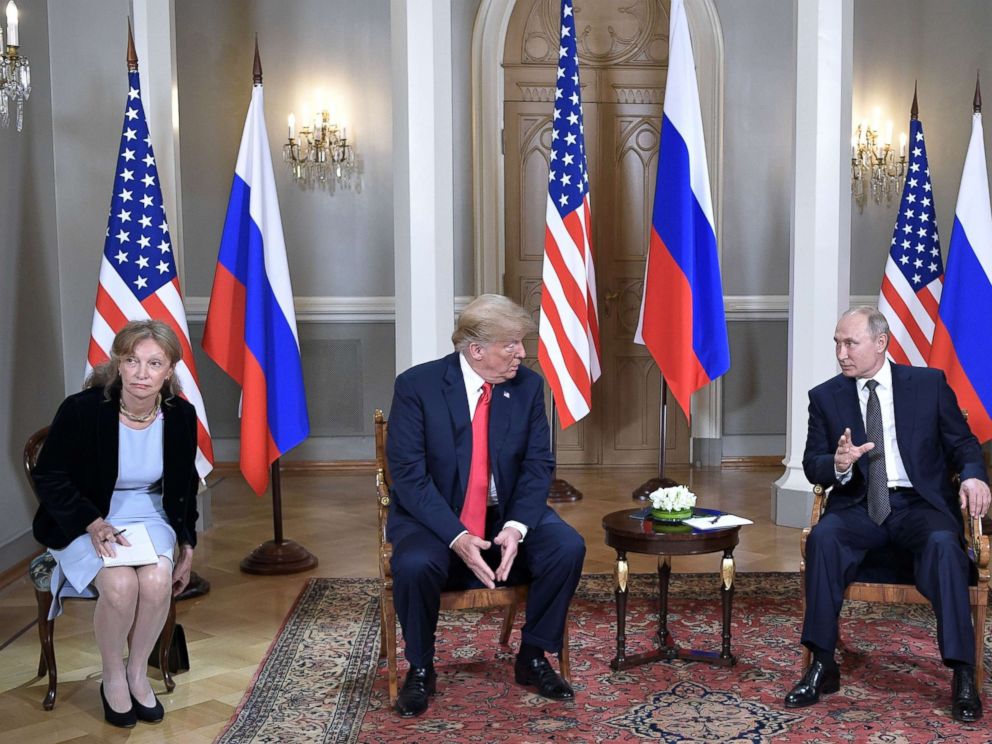 PHOTO: President Donald Trump meets with Russian President Vladimir Putin at the Presidential Palace in Helsinki, Finland, July 16, 2018. In picture at left is seen US interpreter Marina Gross.