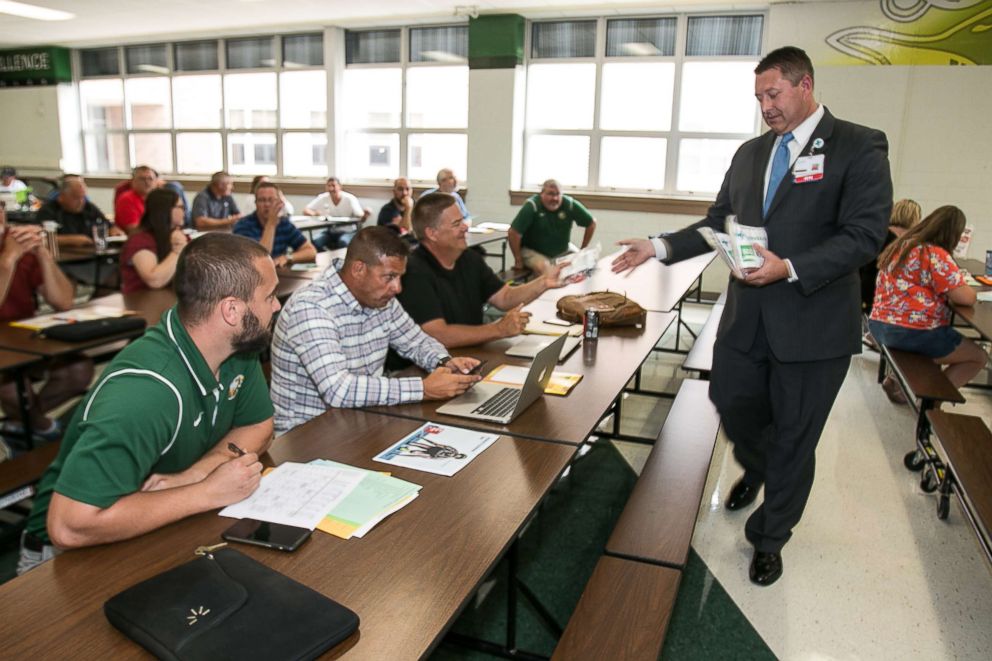 PHOTO: School officials present #StoptheBleed Kits to staff on Aug 14, 2018.