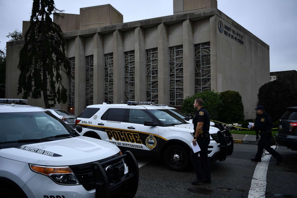 PHOTO: In this Oct. 28, 2018, file photo, a member of the Pittsburgh police stands outside the Tree of Life Synagogue after a shooting there left 11 people dead in the Squirrel Hill neighborhood of Pittsburgh.