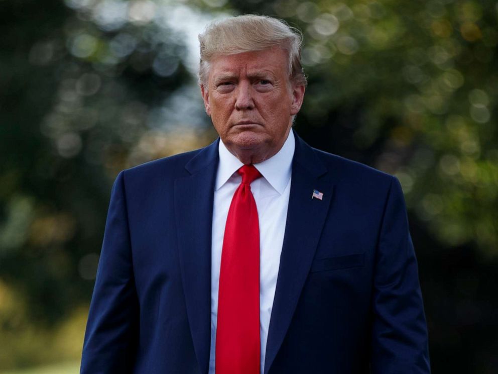 PHOTO: President Donald Trump walks over to speak to reporters before departing for a campaign rally in Cincinnati, on the South Lawn of the White House, Aug. 1, 2019, in Washington.