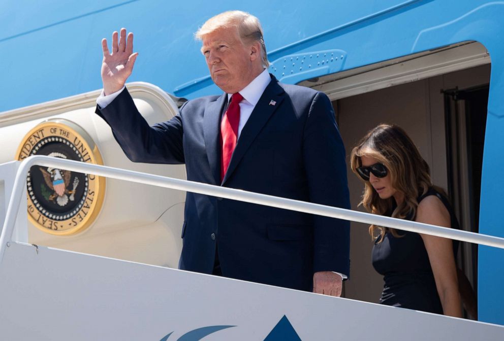 PHOTO: US President Donald Trump and First Lady Melania Trump disembark from Air Force One upon arrival at El Paso International Airport in El Paso, Texas, August 7, 2019.