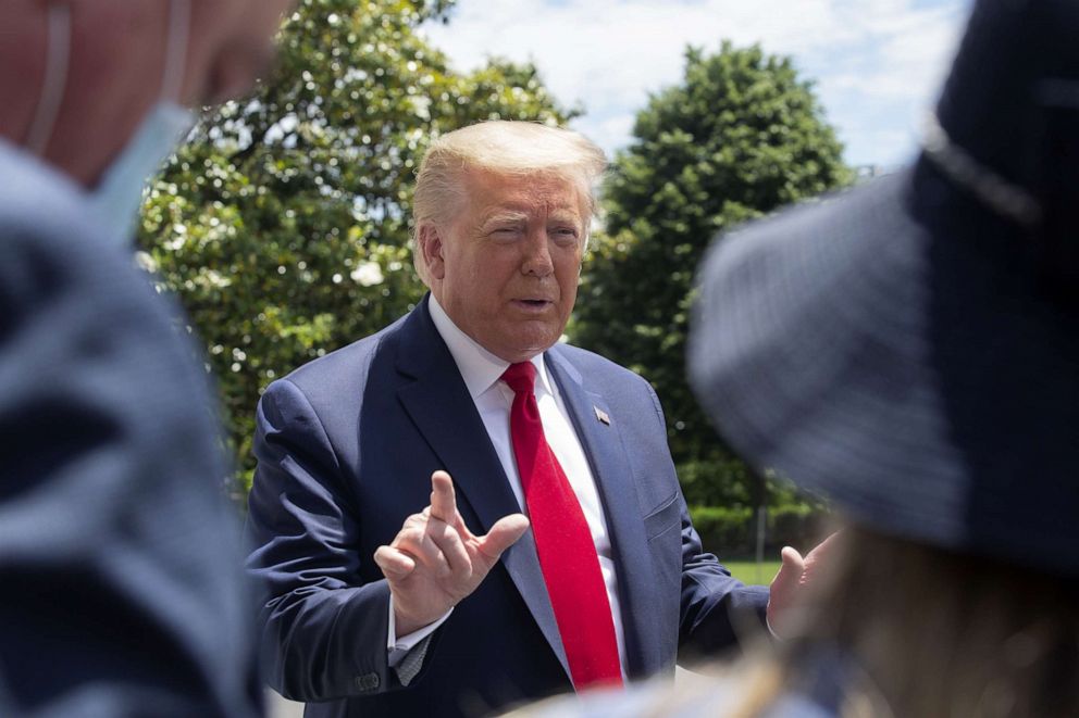 PHOTO: President Donald Trump speaks to members of the media as he departs the White House in Washington, D.C., on Saturday, May 30, 2020.
