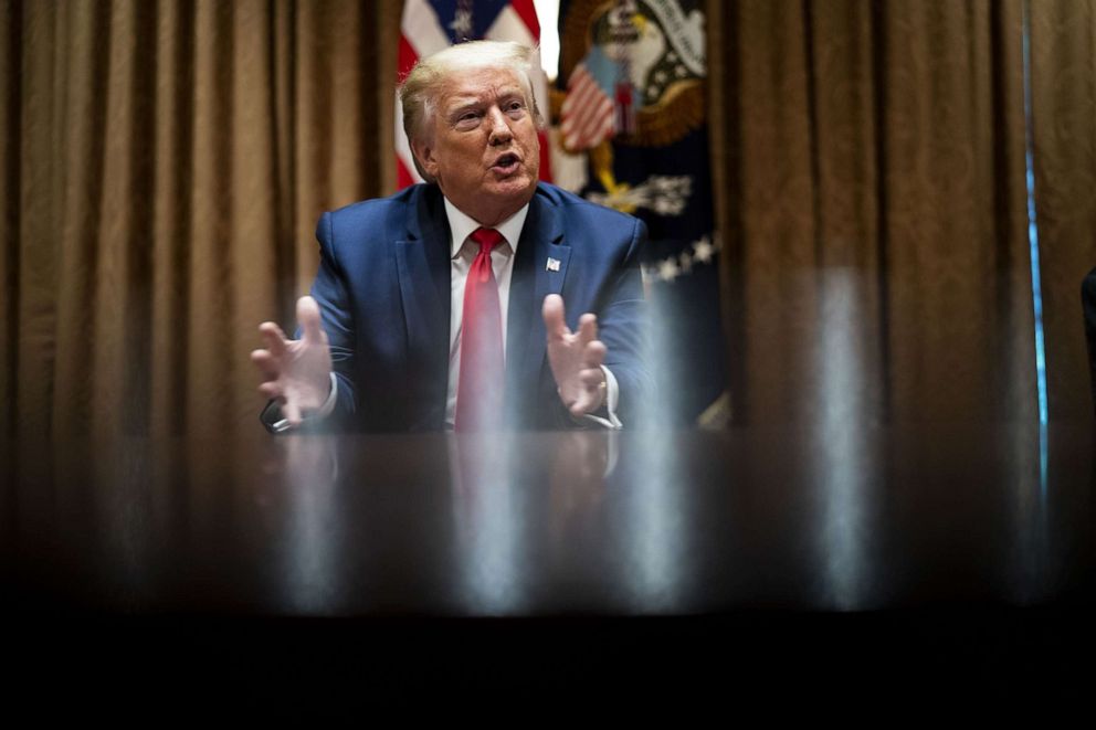 PHOTO: U.S. President Donald Trump speaks during a meeting with African-American supporters in the Cabinet Room of the White House in Washington, D.C., June 10, 2020.