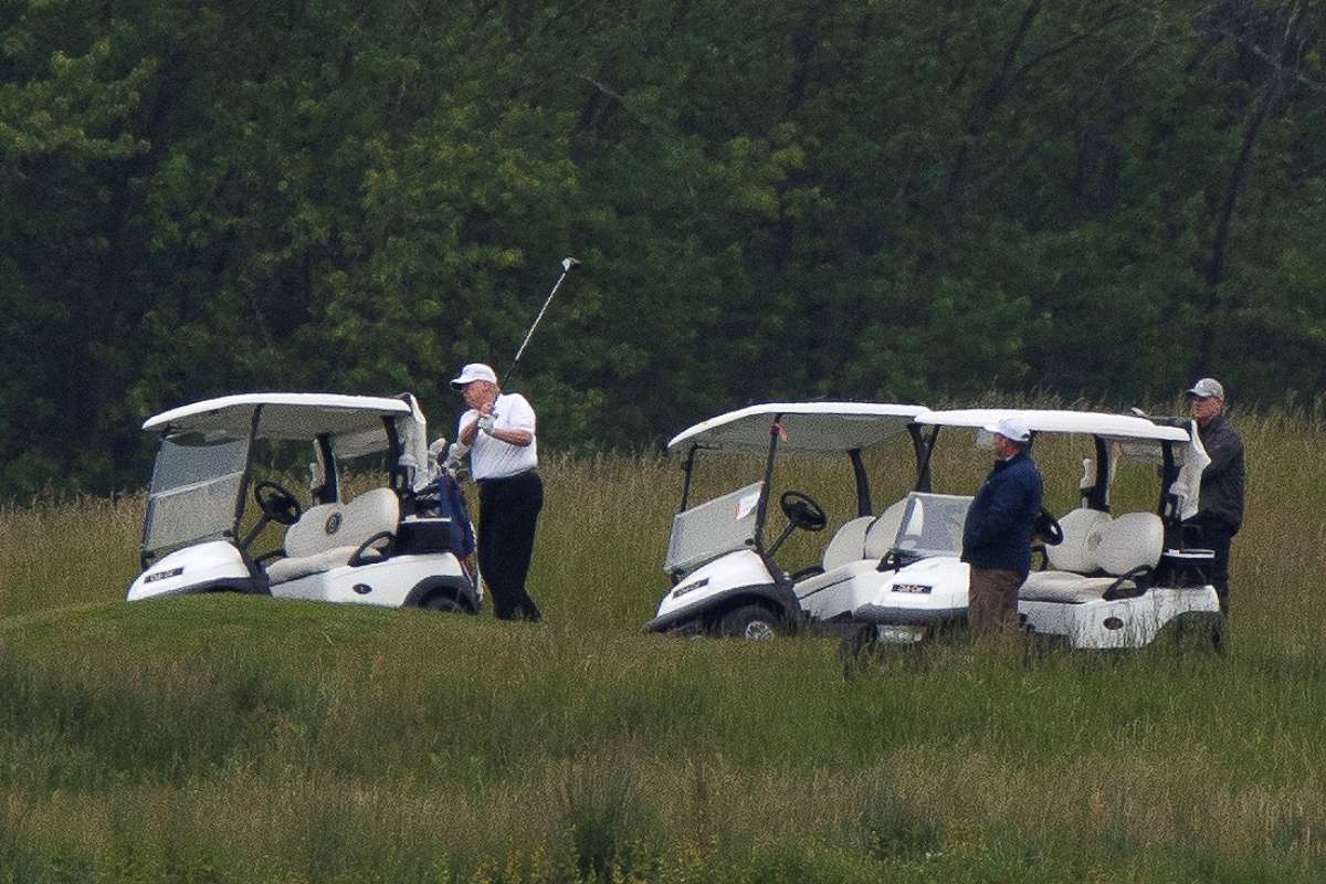 PHOTO: President Donald Trump participates in a round of golf at the Trump National Golf Course amid the coronavirus disease (COVID-19) outbreak, in Sterling, Virginia, U.S., May 24, 2020.