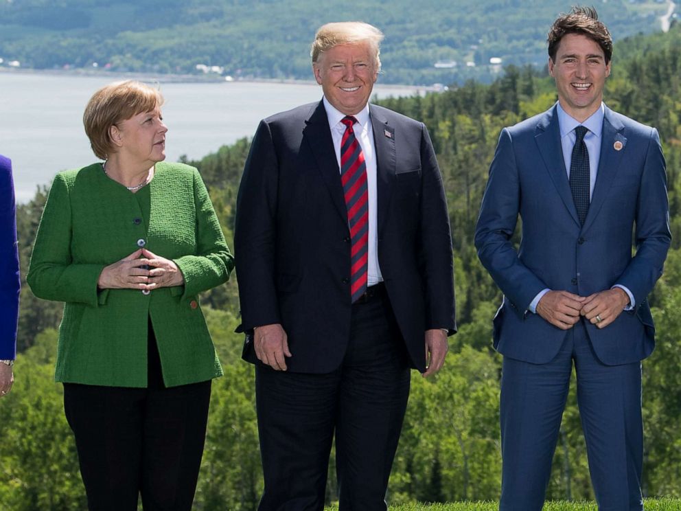 PHOTO: British Prime Minister Theresa May, German Chancellor Angela Merkel, US President Donald Trump, and Canadian Prime Minister Justin Trudeau pose for a family photo during the G7 Summit in in La Malbaie, Quebec, Canada, June 8, 2018.