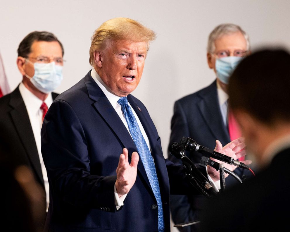 PHOTO: President Donald Trump speaks with the press after attending the Republican caucus lunch at the Hart Senate Office Building.