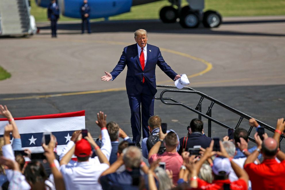 PHOTO: President Donald Trump greets supporters during a campaign event at North Star Aviation on Aug. 17, 2020 in Mankato, Minnesota.