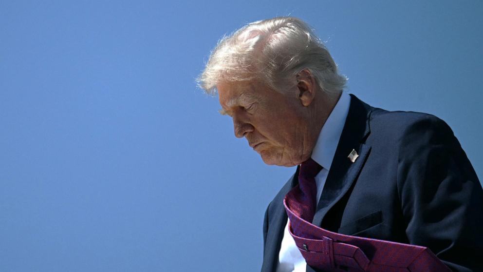 PHOTO: President Donald Trump steps off of Air Force One upon arrival at Phoenix Sky Harbor International Airport in Phoenix, Arizona, on April 17, 2026. 