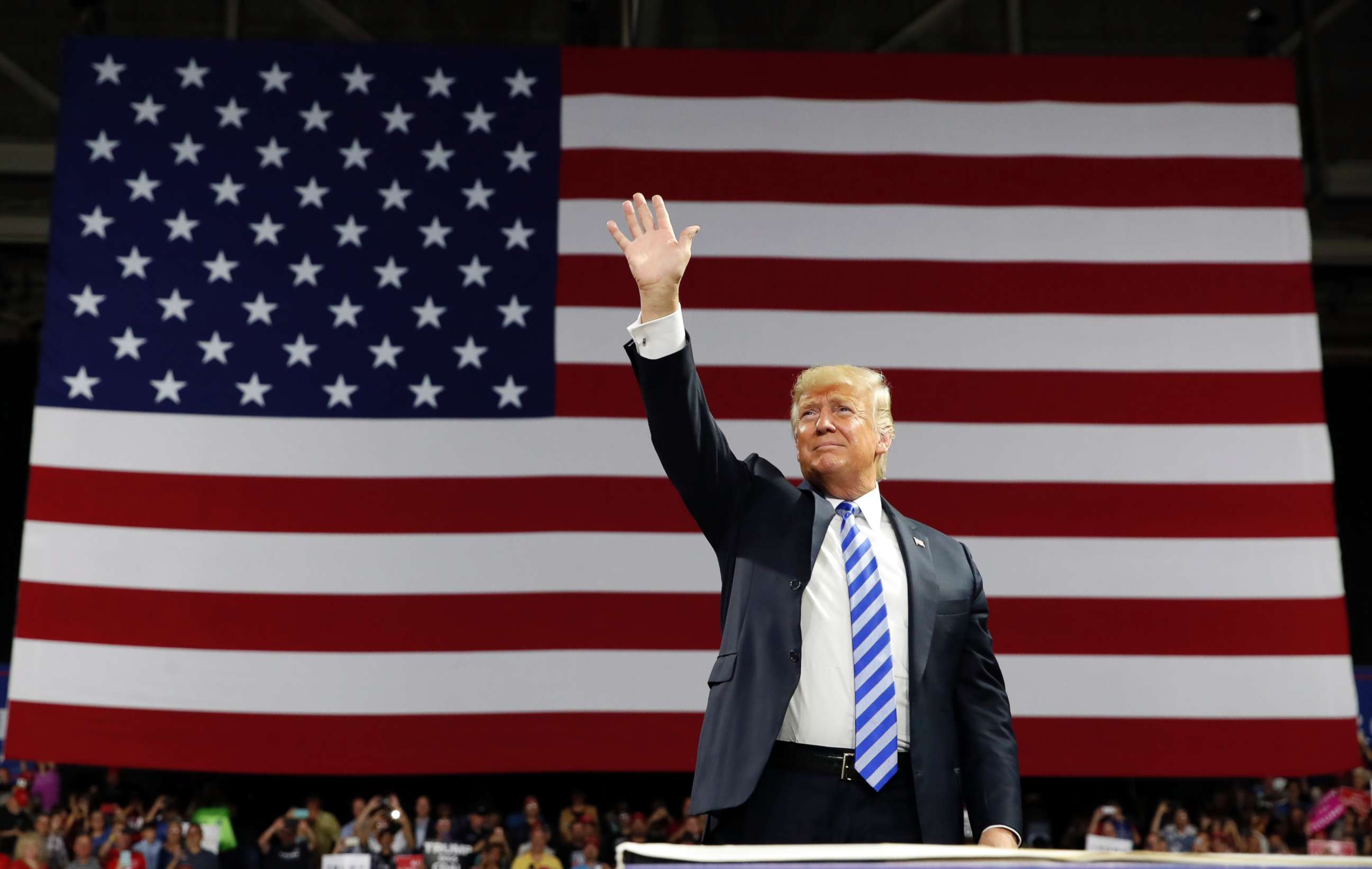 PHOTO: Donald Trump waves as he arrives to speak during a rally, Aug. 21, 2018, in Charleston, W.Va.