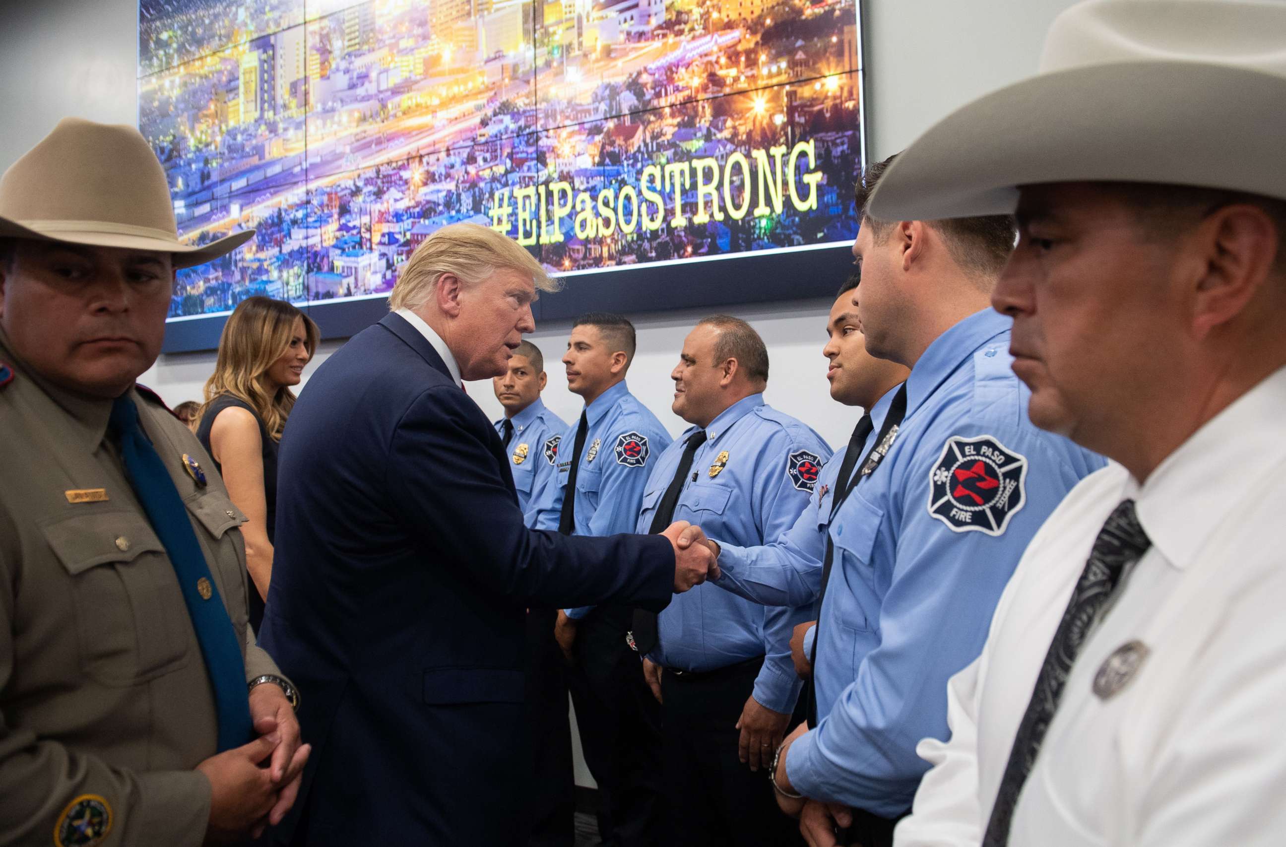 PHOTO: US President Donald Trump greets first responders as he visits El Paso Regional Communications Center in El Paso, Texas, August 7, 2019.