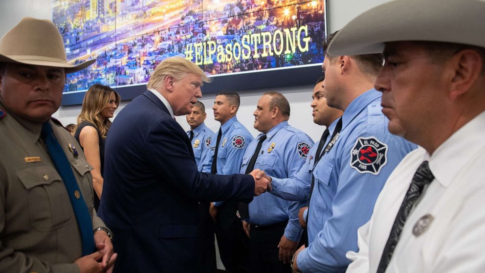 PHOTO: US President Donald Trump greets first responders as he visits El Paso Regional Communications Center in El Paso, Texas, August 7, 2019.