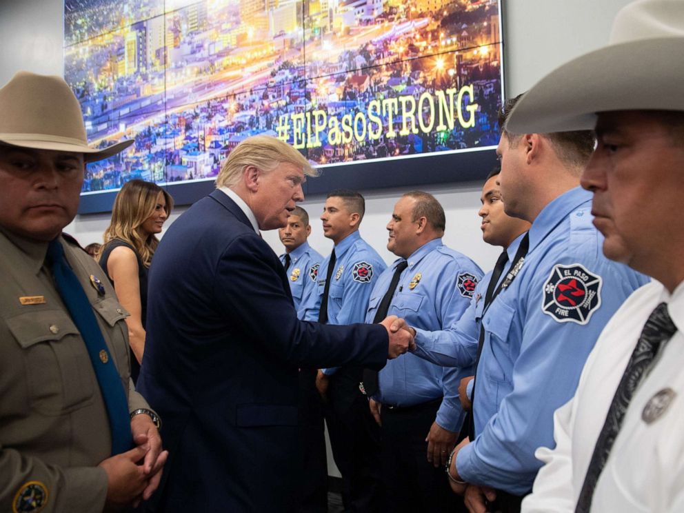 PHOTO: US President Donald Trump greets first responders as he visits El Paso Regional Communications Center in El Paso, Texas, August 7, 2019.
